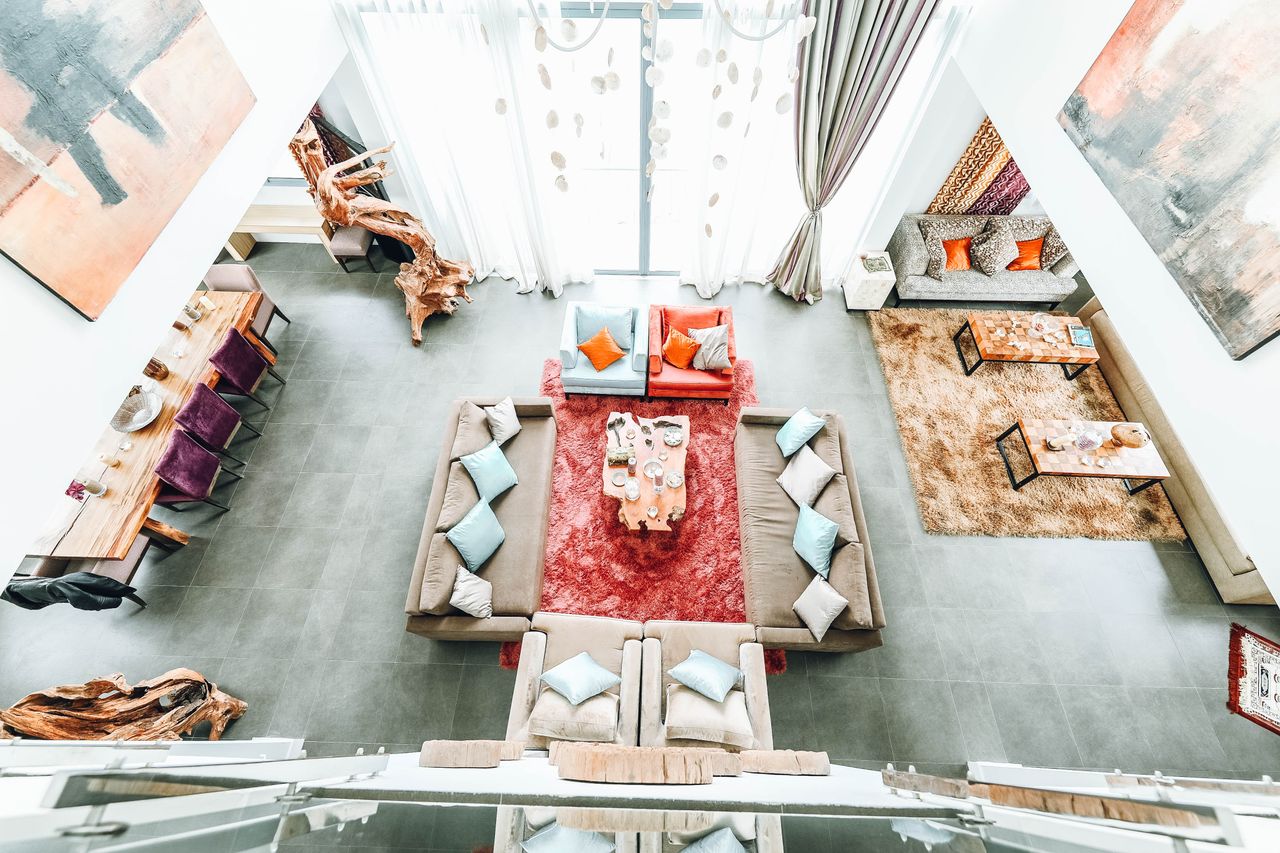 category-05 Bright, spacious living room with contemporary design, featuring cozy sofas and vibrant decor elements.